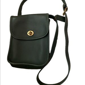 Vintage Coach cross body bag . Forrest green with brass fittings.